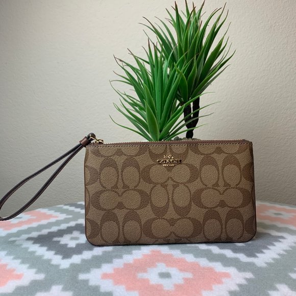 Coach Handbags - COACH LARGE WRISTLET IN SIGNATURE COATED CANVAS